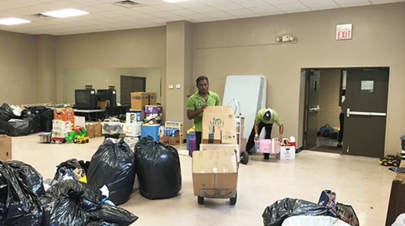 Thomas DeLadurantey, owner of You Move Me Atlanta (left) with team members Francio Lavilette and Donnie Mckenzie drove the moving truck packed with donated items by Brookhaven residents for Louisiana flood victims. Contributed by You Move Me Atlanta.