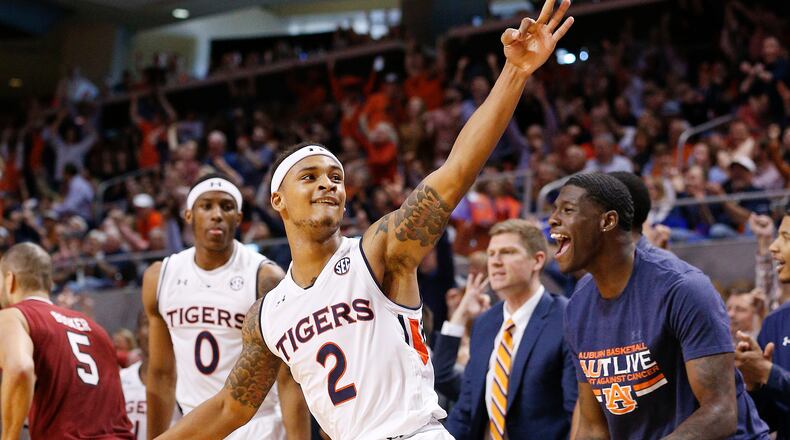 Auburn guard Bryce Brown (2) celebrates after scoring a three-point basket during the second half of an NCAA college basketball game against South Carolina, Saturday, March 3, 2018, in Auburn, Ala.