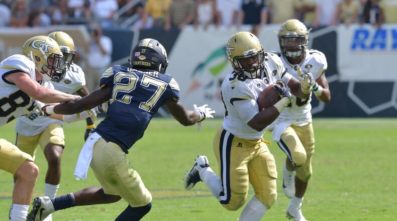 Georgia Tech running back KirVonte Benson (30) breaks away for a go-ahead touchdown in the second half of an NCAA college football game at Bobby Dodd Stadium on Saturday, September 23, 2017. Georgia Tech won 35 - 17 over the Pittsburgh. HYOSUB SHIN / HSHIN@AJC.COM