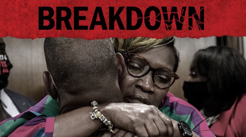 Ahmaud Arbery's mother, Wanda Cooper-Jones his hugged by a supporter in the Glynn County Courthouse in Brunswick, Ga., after the jury convicted three men in her son's 2020 death. The 18th episode of the AJC's 'Breakdown' podcast looks at the conclusion of the murder trial. (Stephen B. Morton / AP)