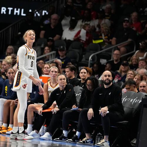 Indiana Fever guard Sophie Cunningham (8) reacts to a foul in the first half of an WNBA basketball game against the Atlanta Dream Sunday, Aug. 16, 2026, in Atlanta. (AP Photo/Brynn Anderson)