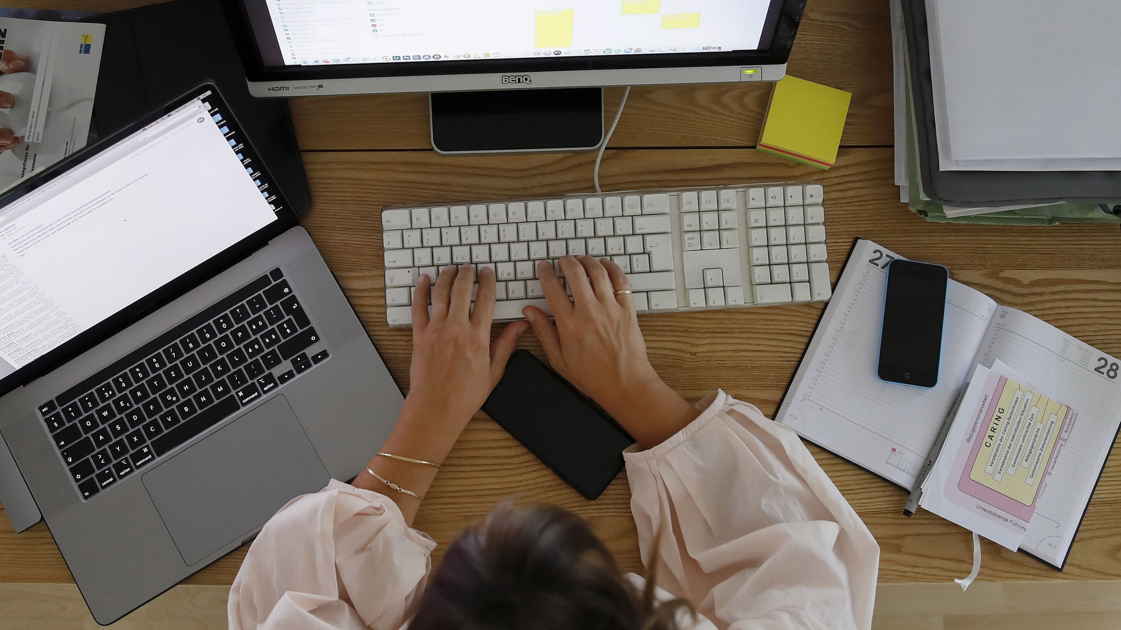 "Rigid workplace policies do not only affect mothers. Everyone benefits when work cultures recognize people as whole human beings," writes Amanda Forgione (Stefan Wermuth/Bloomberg).