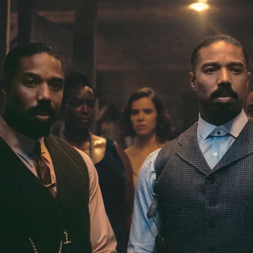 This image released by Warner Bros Pictures shows Michael B. Jordan, foreground from left, Michael B. Jordan and Omar Benson Miller in a scene from "Sinners." (Warner Bros. Pictures via AP)