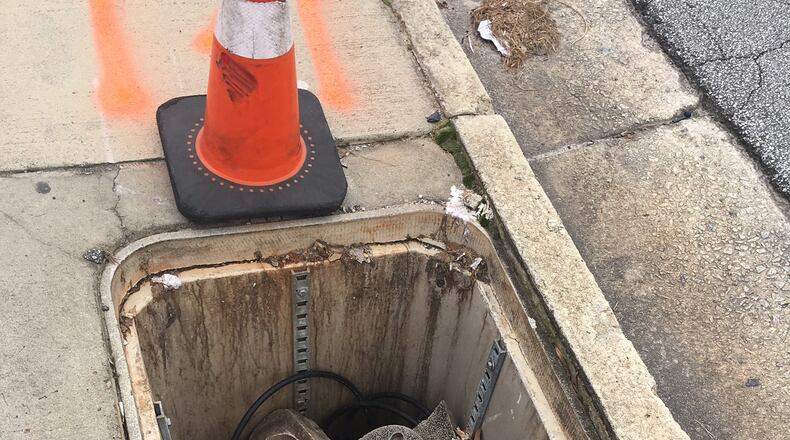 Lynn Spent wants this hole in DeKalb County repaired. Photo/Lynn Spent.