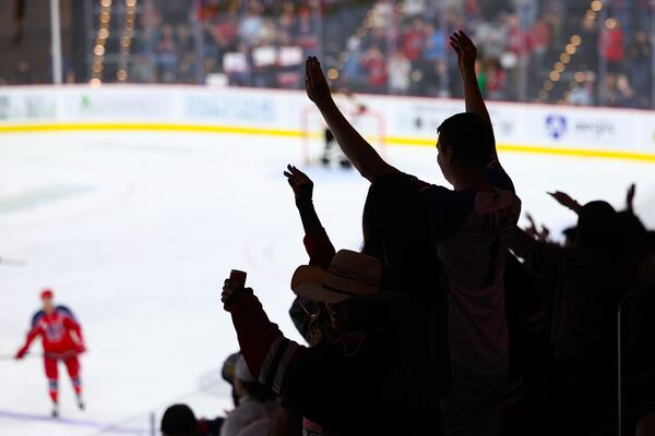 Athens Rock Lobsters fans react after a goal during the second period of a game against the Indiana Sentinels. (Colin Hubbard for the AJC) 
