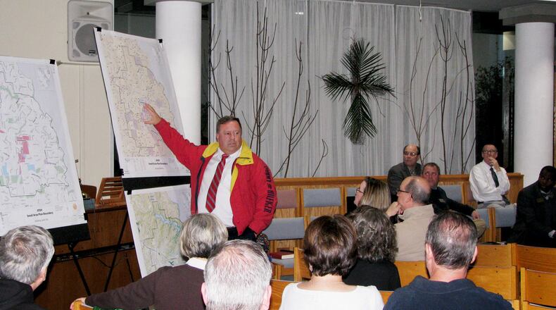 Cobb Commissioner Bob Ott describes the JOSH area at the intersection of Johnson Ferry and Shallowford Roads during the first of three public meetings that was held on March 26. Courtesy of Cobb County