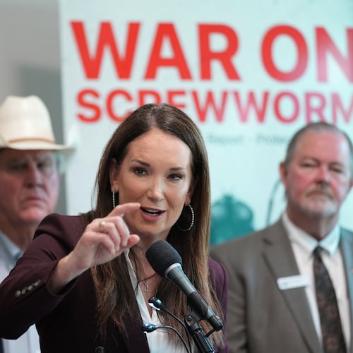 U.S. Agriculture Secretary Brooke Rollins, center, holds a news conference with ranchers, researchers and officials at the Knipling-Bushland U.S. Livestock Insects Research Laboratory in Kerrville, Texas, Monday, June 8, 2026. (AP Photo/Eric Gay)