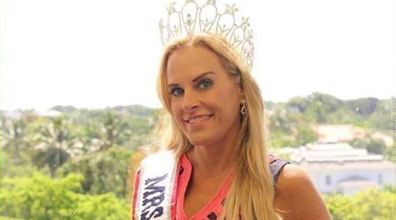 Conservative media commentator Karyn Turk will serve a month in prison for stealing her mother's Social Security checks. She brought a check for $46,000 to court Thursday to reimburse the government.