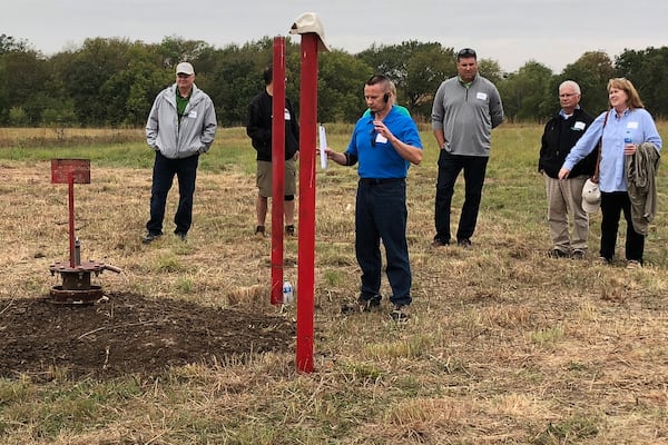 FILE - NioCorp Chief Operating Officer Scott Honan tells a group of investors about the plans for a proposed mine in southeast Nebraska, on Oct. 6, 2021 in Elk Creek, Neb. (AP Photo/Josh Funk, File)