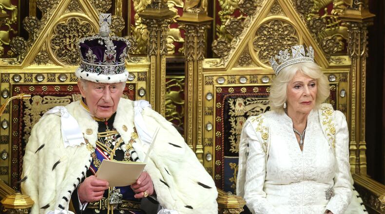 Britain's King Charles III and Queen Camilla attend the state opening of Parliament at the Palace of Westminster in London, Wednesday, May 13, 2026. (Chris Jackson/Pool Photo via AP)