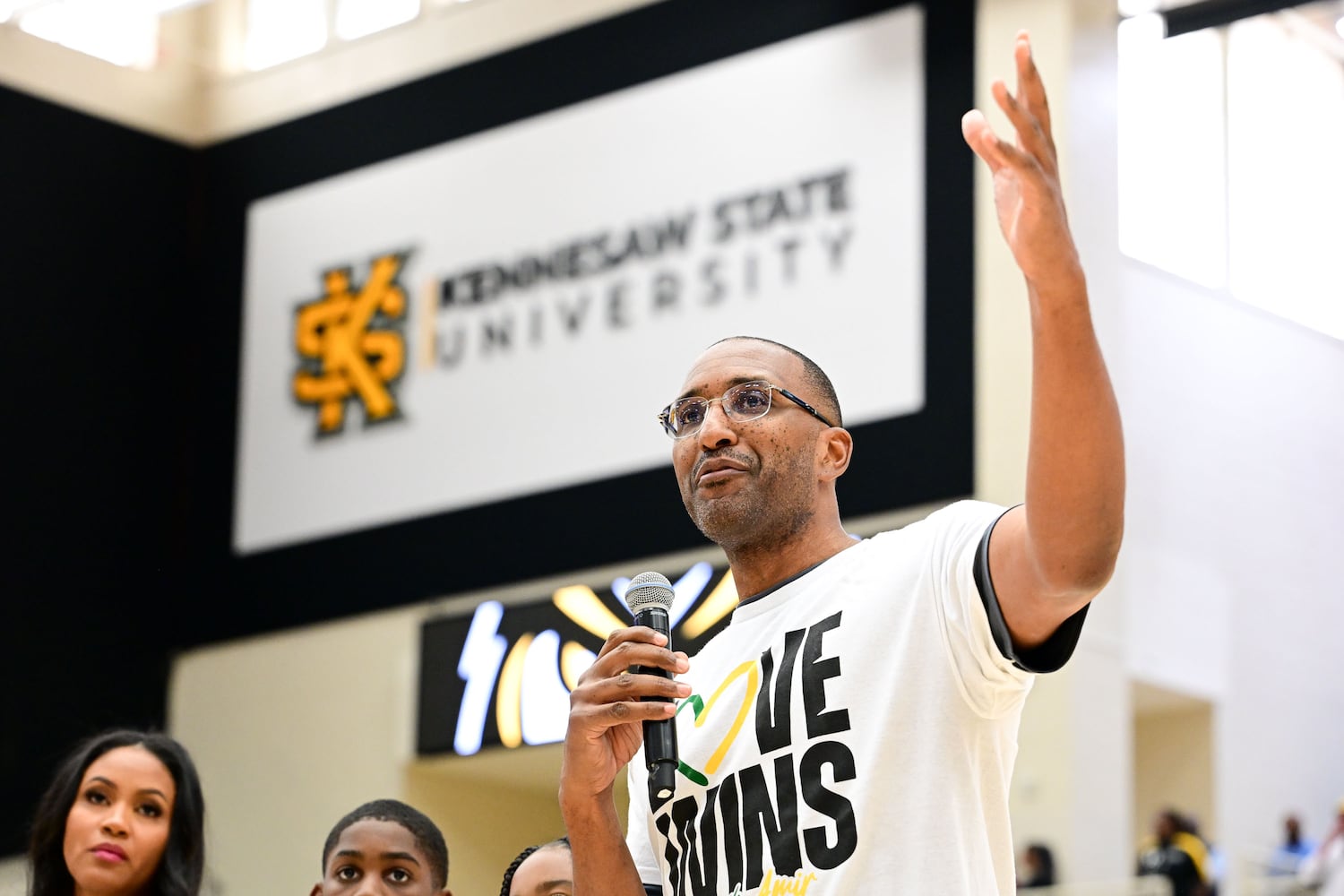 Sharif Abdur-Rahim, brother of former Kennesaw State basketball coach Amir Abdur-Rahim, acknowledges his brother's accomplishments while coach at KSU during halftime Sunday, Nov. 16, 2025 at Kennesaw State University. (Daniel Varnado for the AJC)