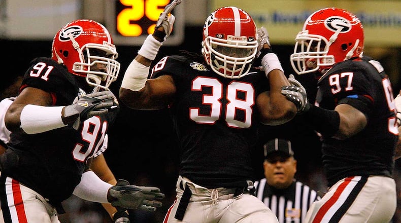 Former UGA player Marcus Howard (38) celebrates after a sack in the 2008 Sugar Bowl. Howard was named MVP of Georgia's 41-10 victory over Hawaii.