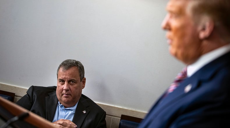 FILE — Former Gov. Chris Christie of New Jersey looks on as President Donald Trump speaks to reporters at the White House on Sept. 27, 2020. Christie stood by Trump during his entire presidency. (Al Drago/The New York Times)