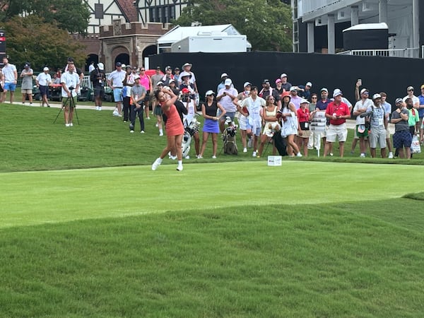 Tisha Alyn tees off on the first hole (No. 10 at East Lake) of the Creator Classic, Aug. 20, 2025. (Stan Awtrey/AJC)