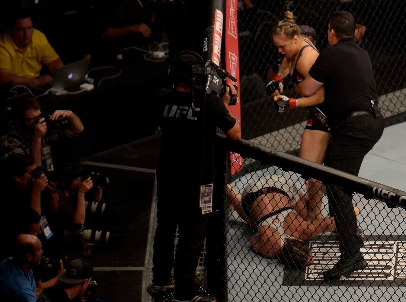 Photos: Rousey knocks out Correia in UFC title bout