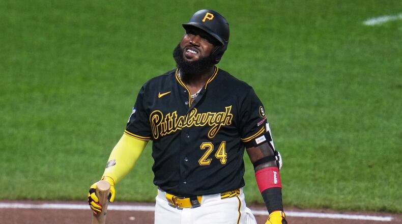 Pittsburgh Pirates' Marcell Ozuna collects himself after fouling off a pitch from Atlanta Braves pitcher Raisel Iglesias during the ninth inning of a baseball game in Pittsburgh, Wednesday, July 8, 2026. (AP Photo/Gene J. Puskar)