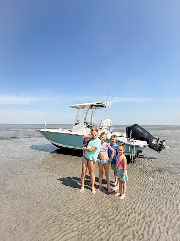 The Hixon and Hillard children were boating with their parents to Ossabaw Island when their mothers discovered the cellphone in a Tupperware container. (Courtesy of Erin Hixson)