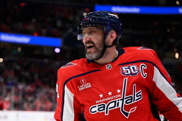 Washington Capitals left wing Alex Ovechkin (8) celebrates his goal during the first period of an NHL hockey game against the Philadelphia Flyers, Thursday, March 20, 2025, in Washington. (AP Photo/Nick Wass)