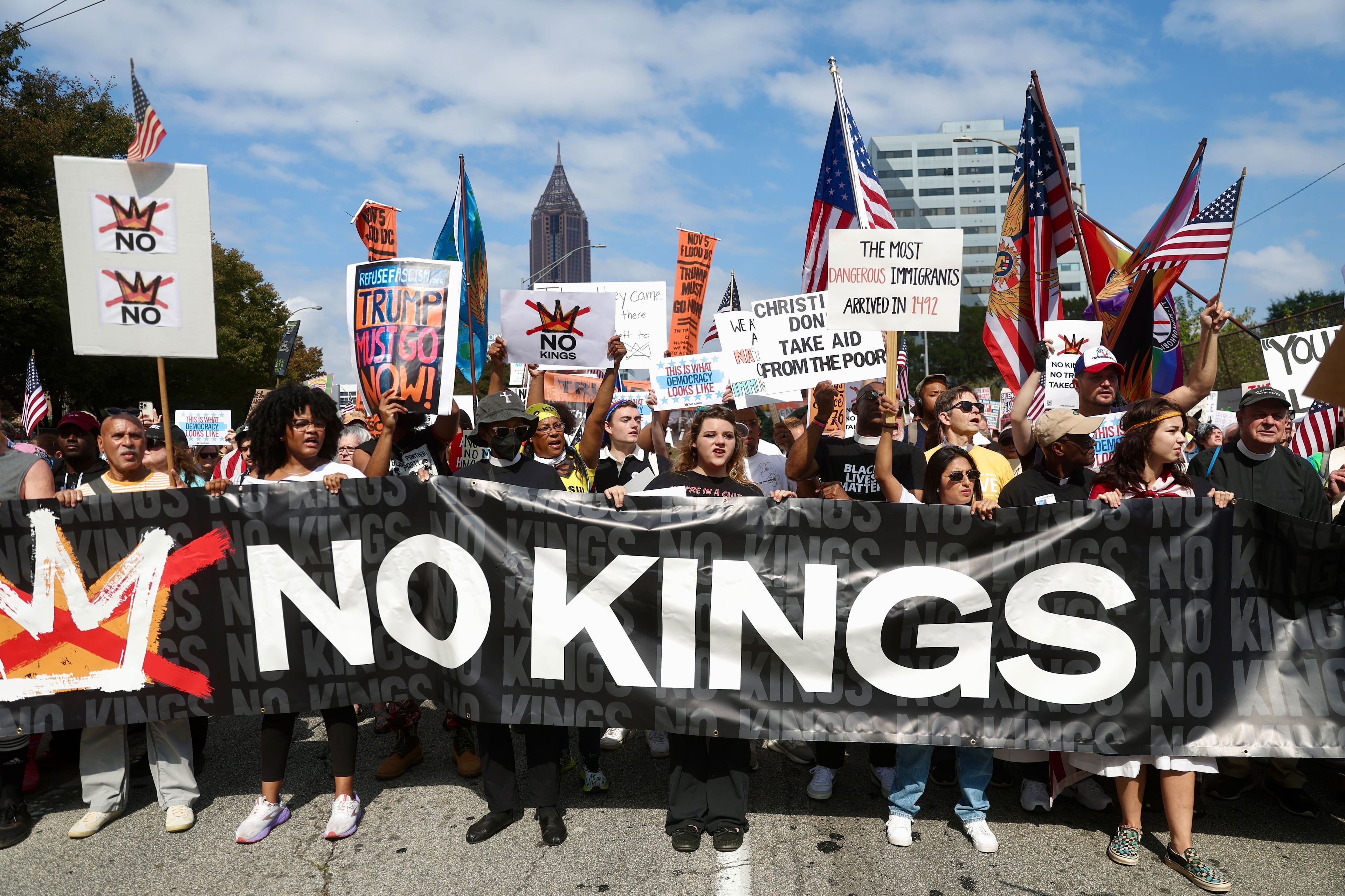 "No Kings" protesters marched down Courtland Street from the Atlanta Civic Center to Liberty Plaza on Saturday. (Abbey Cutrer / AJC)