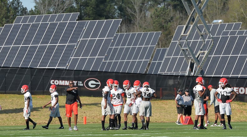 Solar farms have popped up around Georgia in recent years, including this one in Athens. BRANT SANDERLIN/BSANDERLIN@AJC.COM