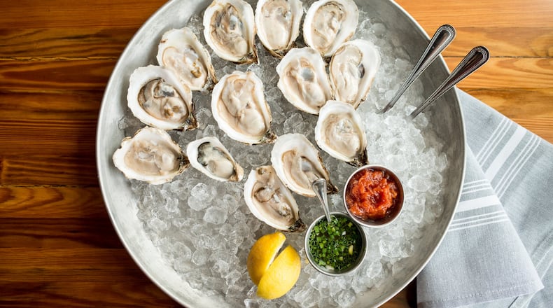 The Lowcountry Oyster Festival hosts oyster-eating and oyster-shucking contests at Boone Hall Plantation in Charleston, S.C. FILE