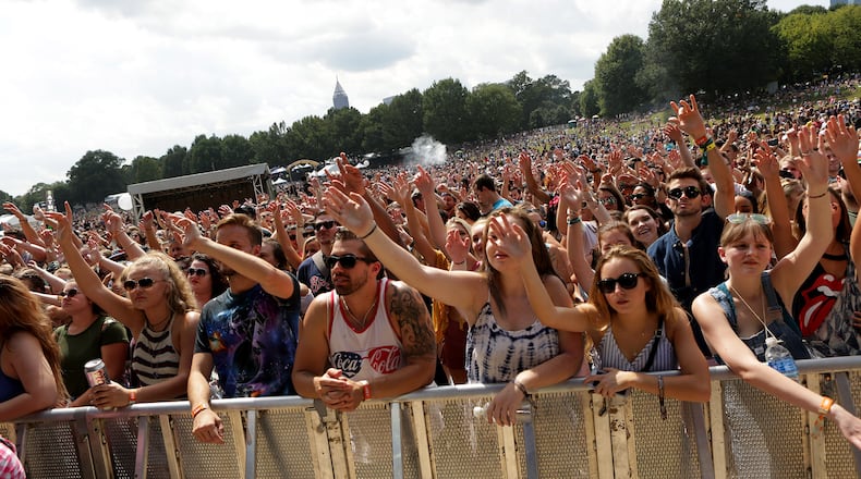 The crowd waves along with Berlin-born singer-songwriter, Bibi Bourelly performing on the Honda stage at the annual Music Midtown Festival at Piedmont Park in Atlanta on Saturday, Sept. 16, 2017. (Akili-Casundria Ramsess/Eye of Ramsess Media)
