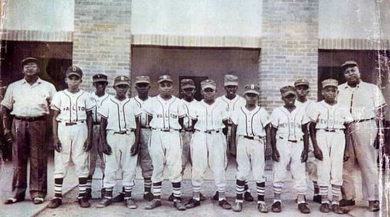 This image provided by Common Pictures shows the 1955 Pensacola Jaycees Little League baseball team. The new documentary "Long Time Coming: A 1955 Baseball Story" chronicles the 1955 game between teams from Orlando and Pensacola, the first integrated Little League game in the South.