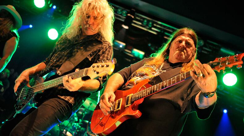 Guitarist Dave Hlubek (R) and bassist Tim Lindsey of American hard rock group Molly Hatchet performing live on stage at Hard Rock Hell VI : A Fistful Of Rock, on November 30, 2012. (Photo by Kevin Nixon/Metal Hammer Magazine/Future Publishing via Getty Images)