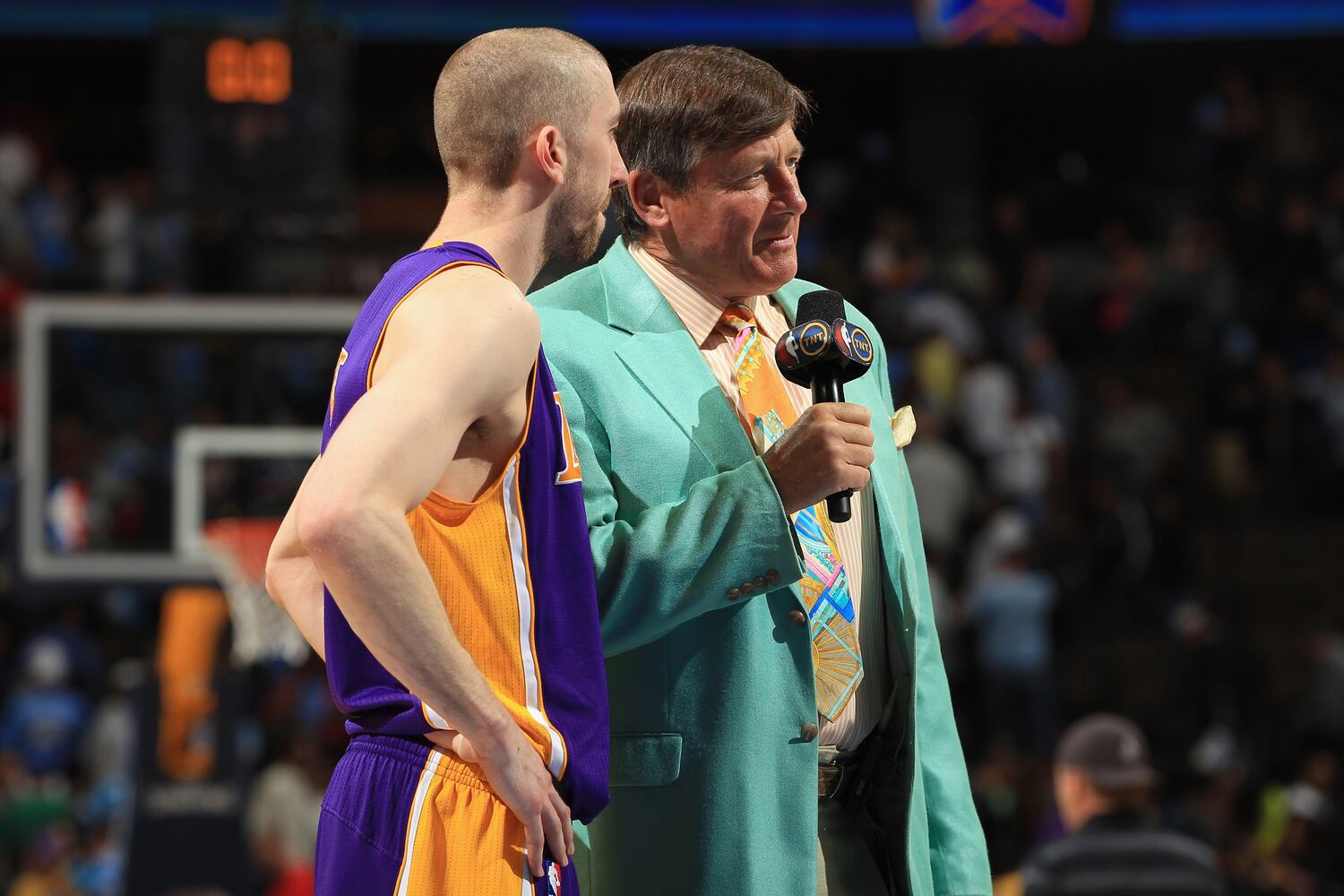 Sideline reporter known as "Mr. Fancy Suit"