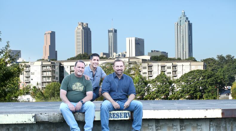 Mitch Steele, Carey Falcone and Bob Powers at the future home of New Realm Brewery near the Atlanta Beltline. Credit: Sara Hanna Photography and New Realm Brewery.