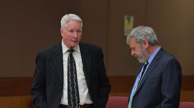 February 28, 2018 Atlanta - Tex McIver (left) talks with defense attorney Don Samuel during a pretrial hearing before Fulton County Chief Judge Robert McBurney on Wednesday, February 28, 2018. HYOSUB SHIN / HSHIN@AJC.COM
