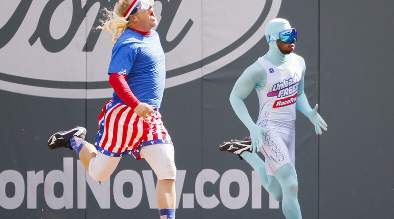 ATLANTA, GA - SEPTEMBER 24: Fox Sports Southeast and former Atlanta Brave Paul Byrd races The Freeze in between innings of an MLB game between The Atlanta Braves and Philadelphia Phillies at SunTrust Park on September 24, 2017 in Atlanta, Georgia. The Philadelphia Phillies won the game 2-0. (Photo by Todd Kirkland/Getty Images)