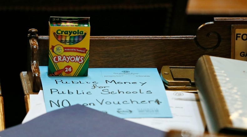 March 7, 2019 - Atlanta - The teacher lobby arranged to put anti-school-voucher props on every desk: boxes of crayons with a slogan scrawled on colored paper. The legislature was in session for "crossover" day, the 28th day of the 2019 General Assembly. Bob Andres / bandres@ajc.com