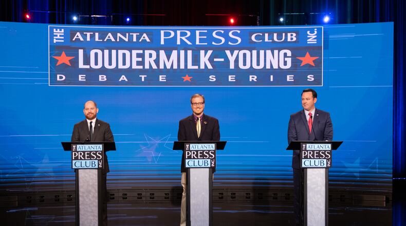 Candidates for Lieutenant Governor Charlie Bailey(R) Ryan Graham(L) and Burt Jones(R) participate in an election debate at the Georgia Public Broadcasting offices in Atlanta, Georgia, U.S. October 18, 2022. REUTERS/Dustin Chambers/Pool