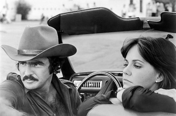 Burt Reynolds and Sally Field in a scene from the movie "Smokey and the Bandit." (Courtesy)