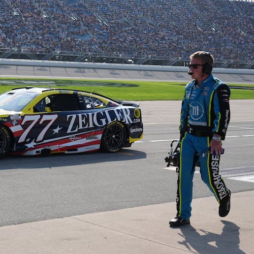 Carson Hocevar (77) drives to the track during a NASCAR Cup Series auto race at Chicagoland Speedway in Joliet, Ill., Sunday, July 5, 2026. (AP Photo/Nam Y. Huh)