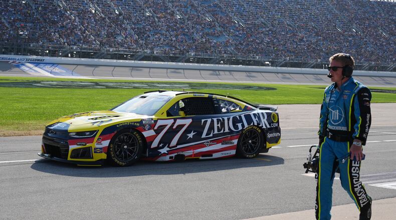Carson Hocevar (77) drives to the track during a NASCAR Cup Series auto race at Chicagoland Speedway in Joliet, Ill., Sunday, July 5, 2026. (AP Photo/Nam Y. Huh)