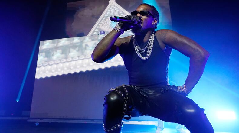 FILE - Rapper Offset makes a guest appearance during Metro Boomin's set at Billboard R&B Hip-Hop Live, a celebration of the 50th anniversary of hip-hop, at The Novo, in Los Angeles, Aug. 8, 2023. (AP Photo/Chris Pizzello, File)