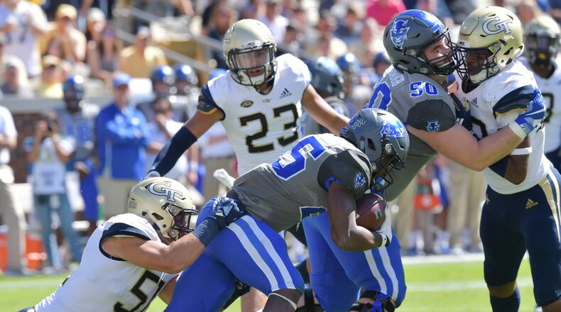 Duke running back Deon Jackson (25) gets tackled by Georgia Tech linebacker Brant Mitchell (51) in the first half of the Oct. 13 game at Bobby Dodd Stadium. (Hyosub Shin/hshin@ajc.com)