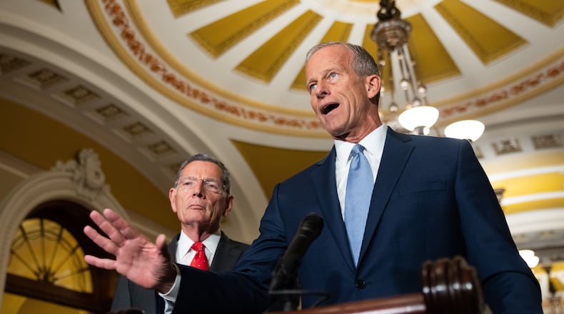 Senate Majority Leader John Thune, R-S.D., speaks to reporters following a weekly policy luncheon at the Capitol in Washington, Tuesday, July 21, 2026. (AP Photo/Allison Robbert)