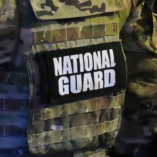 FILE - A member of the National Guard stands watch on Beale St., July 17, 2026, in Memphis, Tenn. (AP Photo/George Walker IV, File)