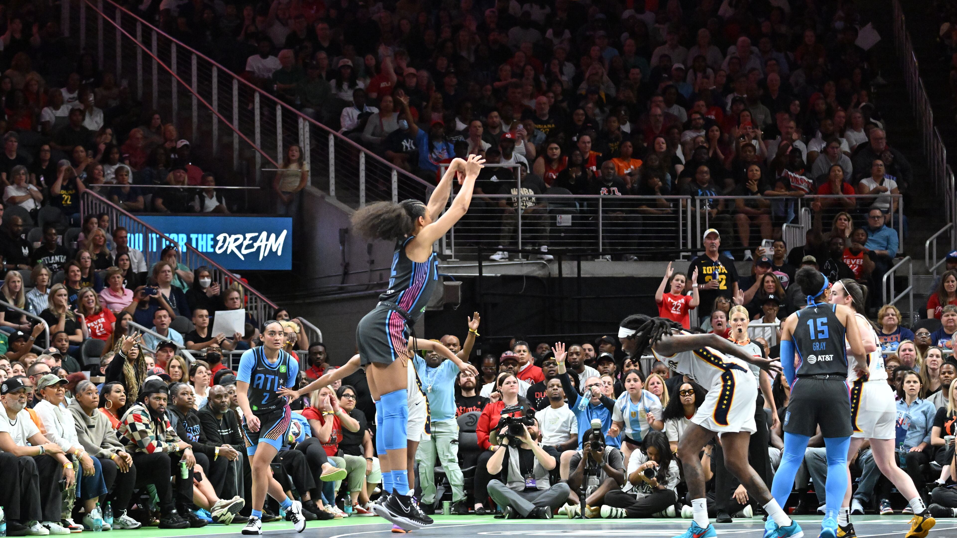 Atlanta Dream forward Nia Coffey (12) gets off a shot during the second half in Atlanta Dream’s home opener at State Farm Arena, Thursday, May 22, 2025, in Atlanta. Indiana Fever won 81-76 over Atlanta Dream. (Hyosub Shin / AJC)