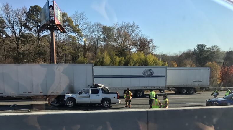 A fatal crash shut down I-75 north in Cobb County Friday. (Credit: Tommy Quick)