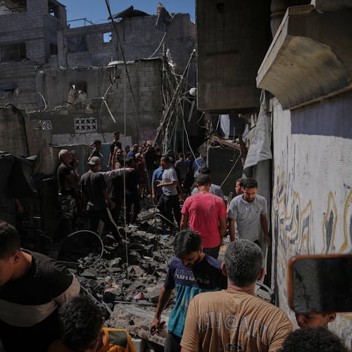 Palestinians inspect a building destroyed in an Israeli airstrike in Gaza City, Wednesday, Sept. 9, 2026. (AP Photo/Jehad Alshrafi)