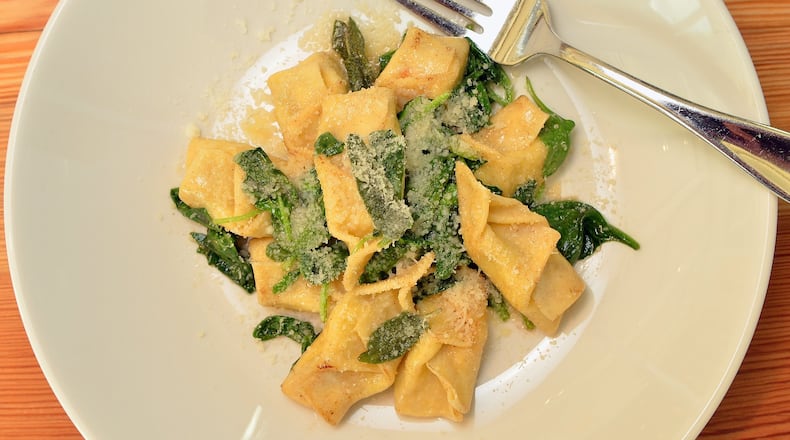 The pi fasacc at Storico Fresco are little envelopes of pasta, folded pockets of lightly salty cheeses just touched with herbs, tossed in butter browned with sage and topped with a wilted little pile of spinach. (Chris Hunt / special)