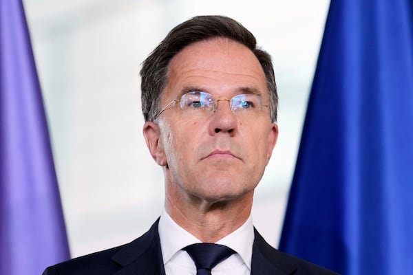 NATO Secretary General Mark Rutte attends a news conference with German Chancellor Friedrich Merz during a meeting at the chancellery in Berlin, Germany, Wednesday, July 9, 2025. (AP Photo/Markus Schreiber)