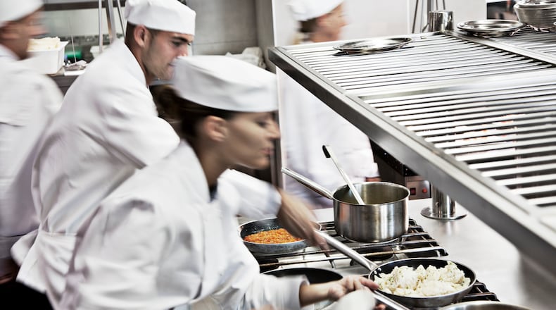 File photo of a restaurant kitchen staff.