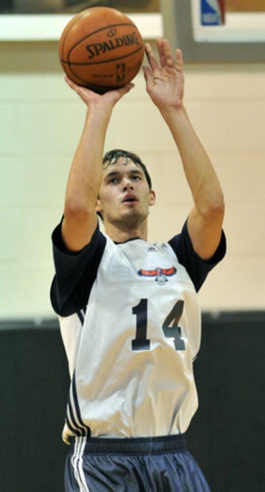 New coach, guard for Hawks