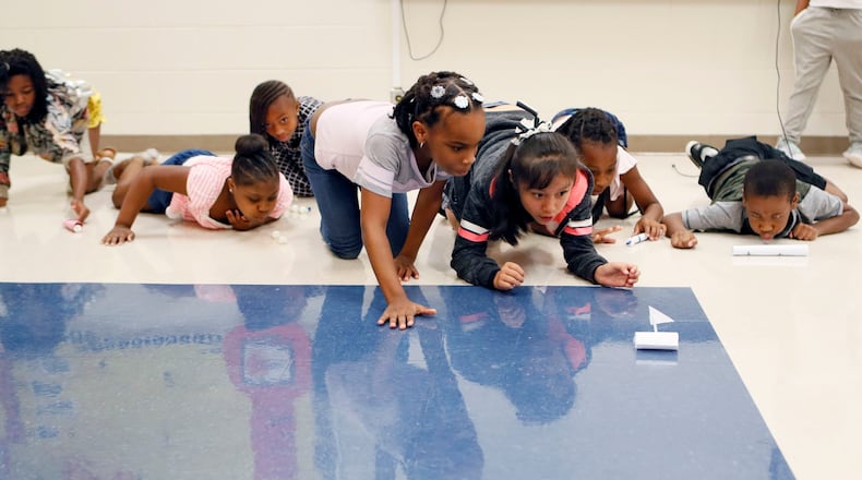Third graders race "puff mobiles" as part of a science project in Atlanta Public Schools' 2018 summer school program at Peyton Forest Elementary School. Bob Andres / bandres@ajc.com