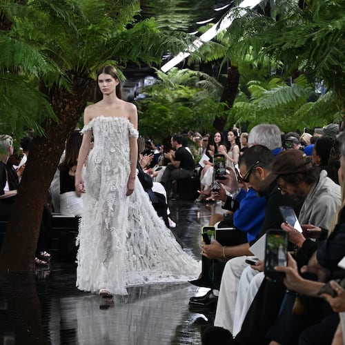 A model wears a creation as part of the Christian Dior Haute Couture Fall/Winter 2026-2027 Women's collection presented in Paris, Monday, July 6, 2026. (AP Photo/Emma Da Silva)